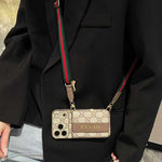 Classic Gucci monogram phone case with card slot & crossbody lanyard
