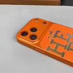 Premium orange leather iPhone case with bold designer typography