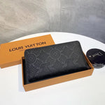 Louis Vuitton Wallet Made of Leather Embossed with the Brand's Logo