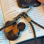 Luxury Monogram Case with Bow Charm & Wrist Lanyard