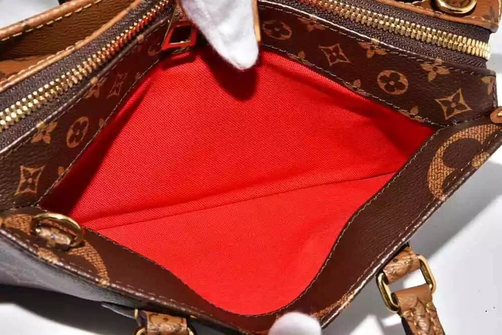 Louis Vuitton Monogram Reverse Giant On The Go EW Handbag