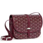 Luxury Goyardine canvas saddle crossbody bag in burgundy