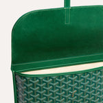 Inside open compartment view of luxury Goyardine canvas messenger bag in green
